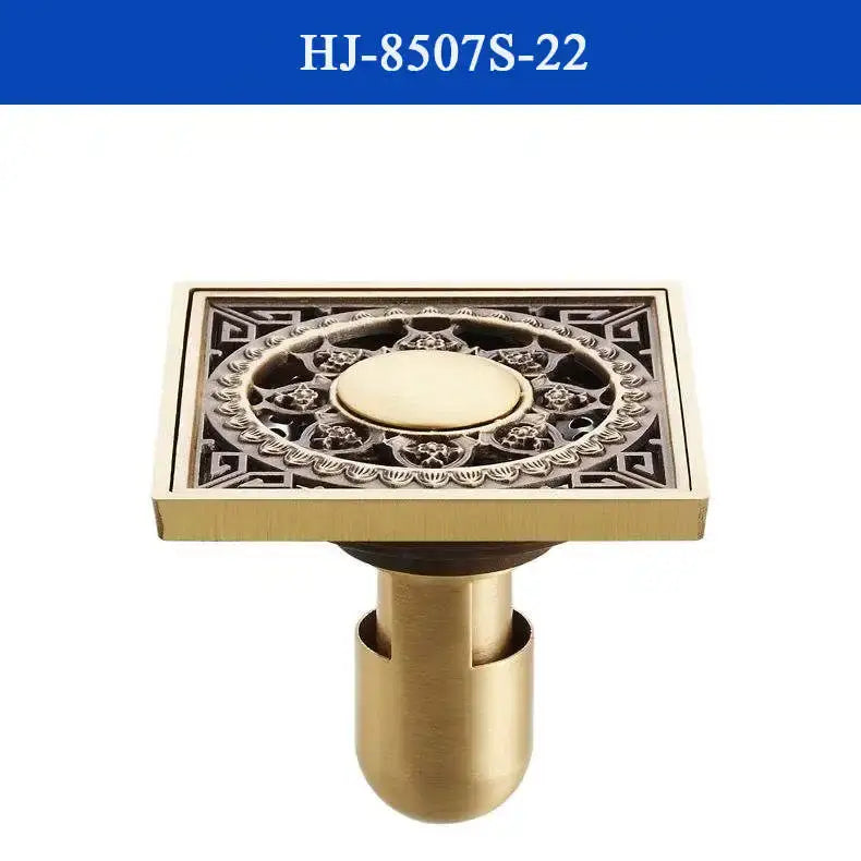 Decorbites antique brass shower drain cover featuring intricate floral and geometric embossing on brass shower drain