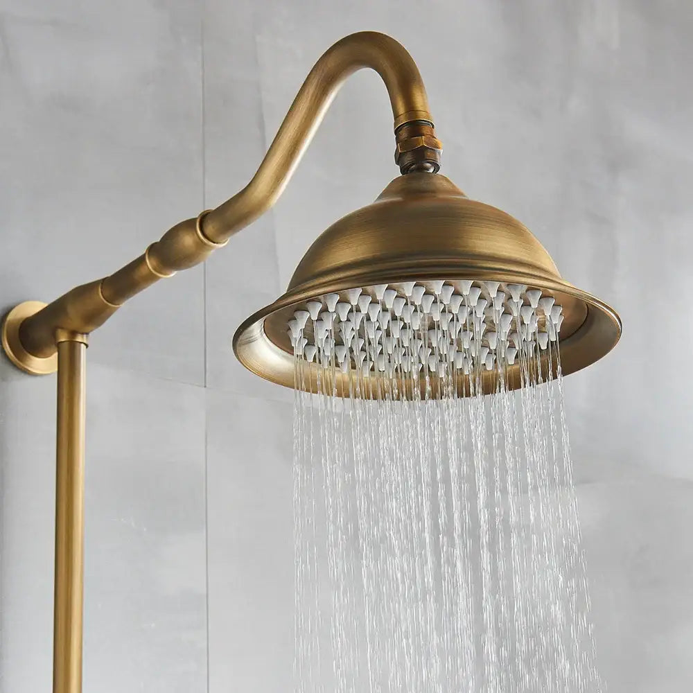 Decorbites antique brass shower faucet with ceramics hand spray and 8 inch rainfall head featuring curved arm and multiple jets