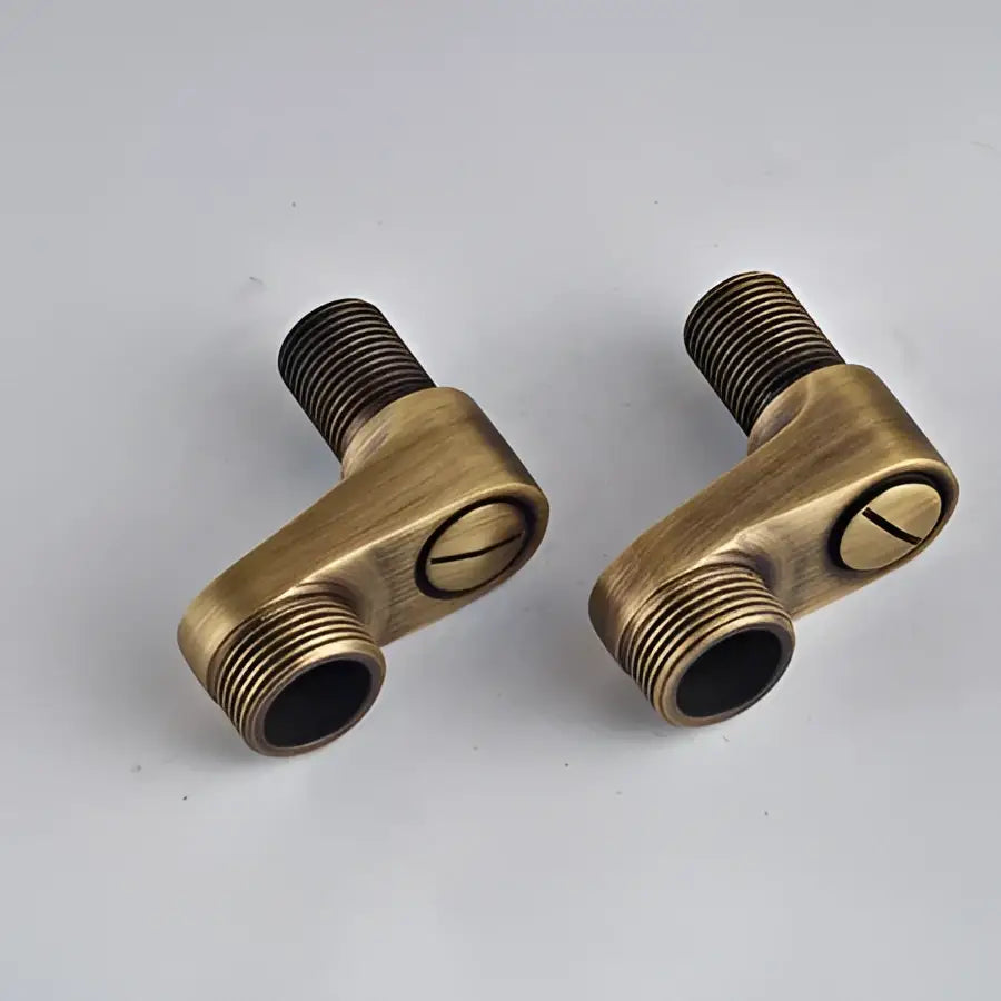 Pair of antique brass l-shaped plumbing fittings with threaded ends for decorbites antique brass shower set use