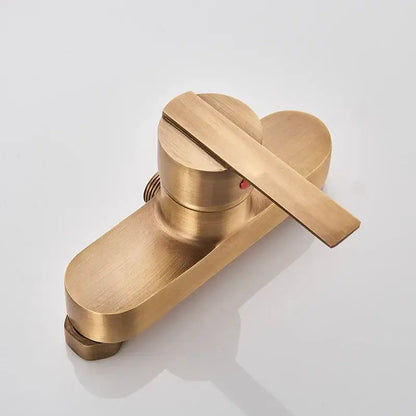 Brass-finished modern shower set with sleek single lever handle in antique brass for wall mount installation