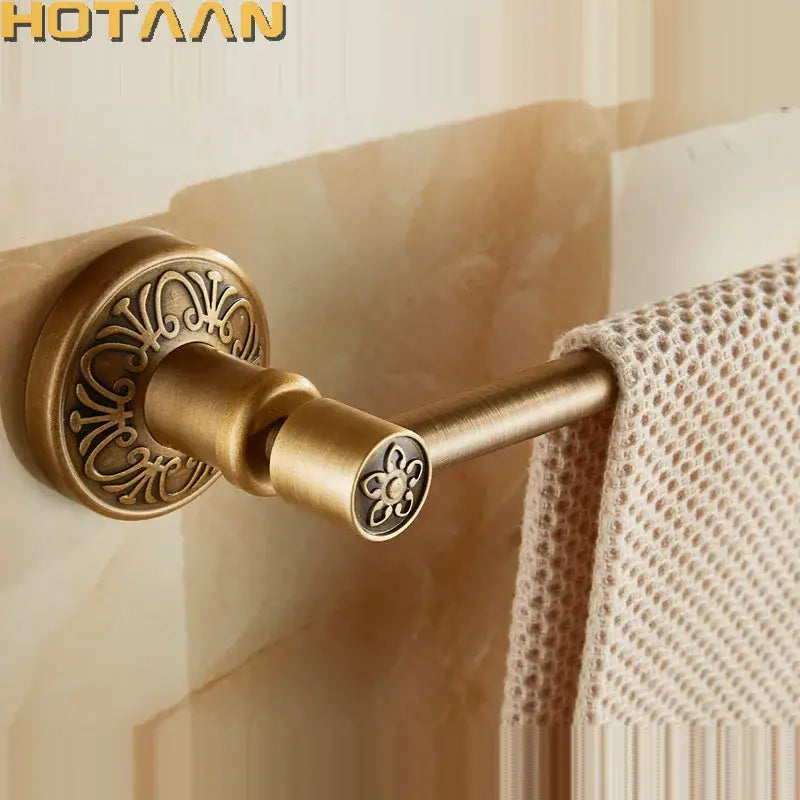 Decorbites antique brass single towel bar wall mounted towel rack with ornate floral engraving on circular base and end cap