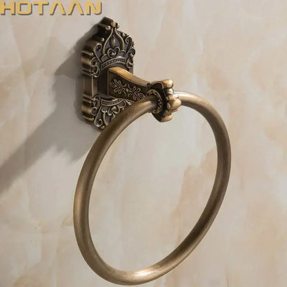 Decorbites antique brass towel ring with ornate crown wall mount and detailed floral engraving for bathroom use