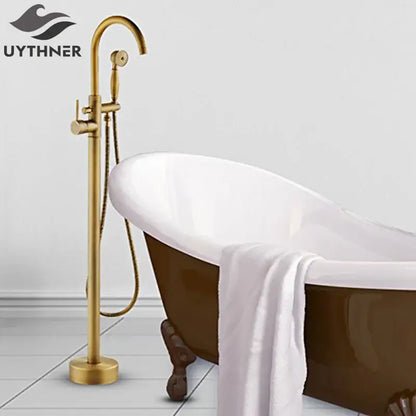 Brass-finished decorbites antique brass tub faucet with swivel spout and handheld showerhead for freestanding bathtubs