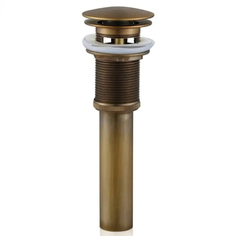 Decorbites™ antique brass vessel sink drain with ornate floral top and white ceramic seals for bathroom use