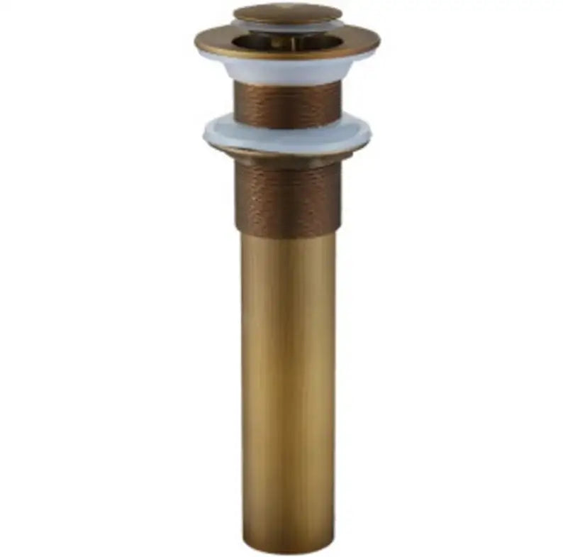 Brass-colored antique brass vessel sink drain with sleek cylindrical design and white rubber seals for bathroom use
