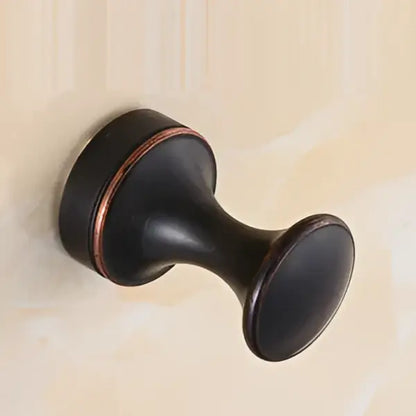 Decorbites™ antique brass wall clothes rack hook with black matte finish and copper accent ring robe hanger