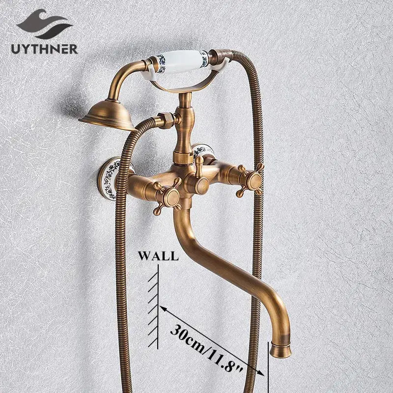 Decorbites antique brass wall mount shower mixer tap with ceramic handles and decorative floral patterns