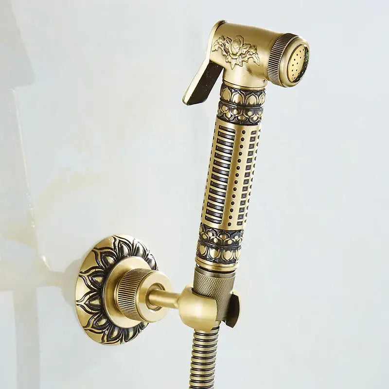 DecorBites™ antique brass wall mount bidet faucet with ornate floral and geometric detailing for hygienic shower spray