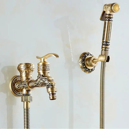 Decorbites™ antique brass wall mounted bidet faucet with ornate dragon head design and matching handheld showerhead
