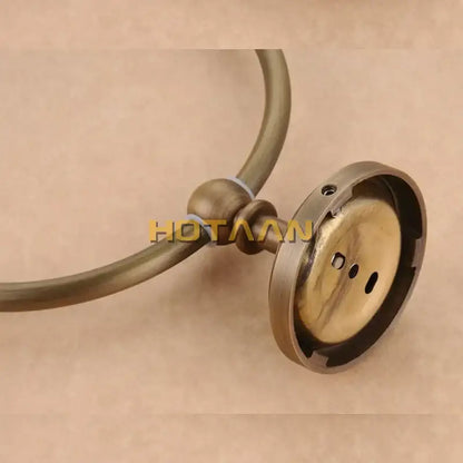 Decorbites antique brass wall-mounted towel ring holder with circular loop and decorative spherical joint