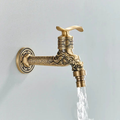 DecorBites™ antique brass wall mounted washing machine faucet with ornate dragon head design and intricate engraved patterns