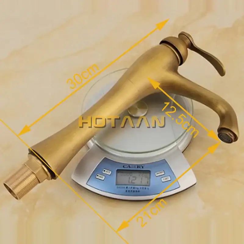 Decorbites antique brass waterfall basin faucet with sleek elongated spout and curved handle yt-5053