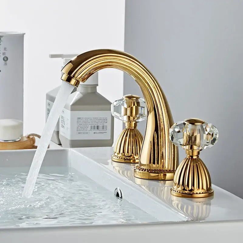 Decorbites antique bronze hole widespread basin faucet with gold finish crystal knobs and ornate fluted detailing