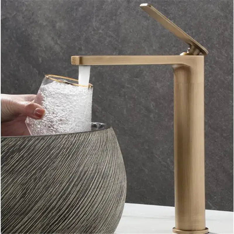 Brass-finished decorbites antique bronze basin faucet with sleek tall design and minimalist handle for bathroom sink