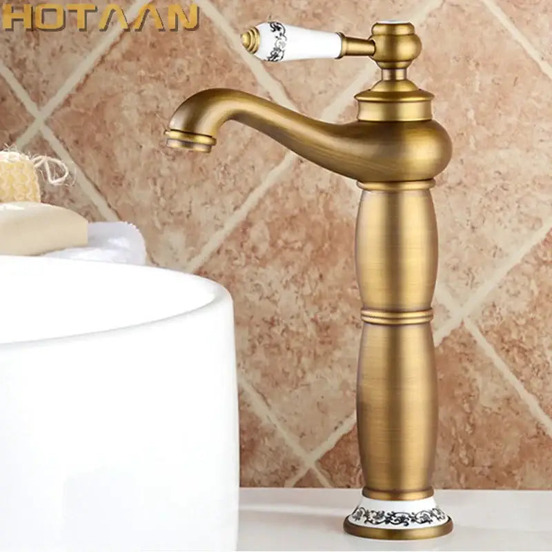 DecorBites antique bronze brass basin faucet with white ceramic handle and black floral patterns in luxury Europe style