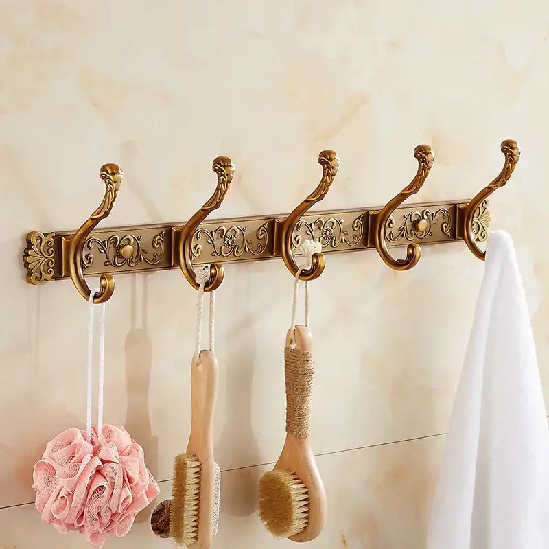 Decorbites antique bronze carved wall-mounted robe hook with ornate scrollwork and four curved hooks for bathroom use