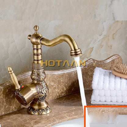 DecorBites antique bronze kitchen basin faucet with ornate floral engravings and curved spout for hot cold water mixing