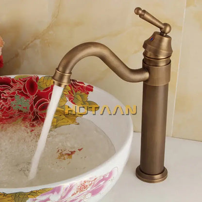 DecorBites™ antique bronze finish single-handle bathroom sink faucet with curved spout and decorative handle YT-5050