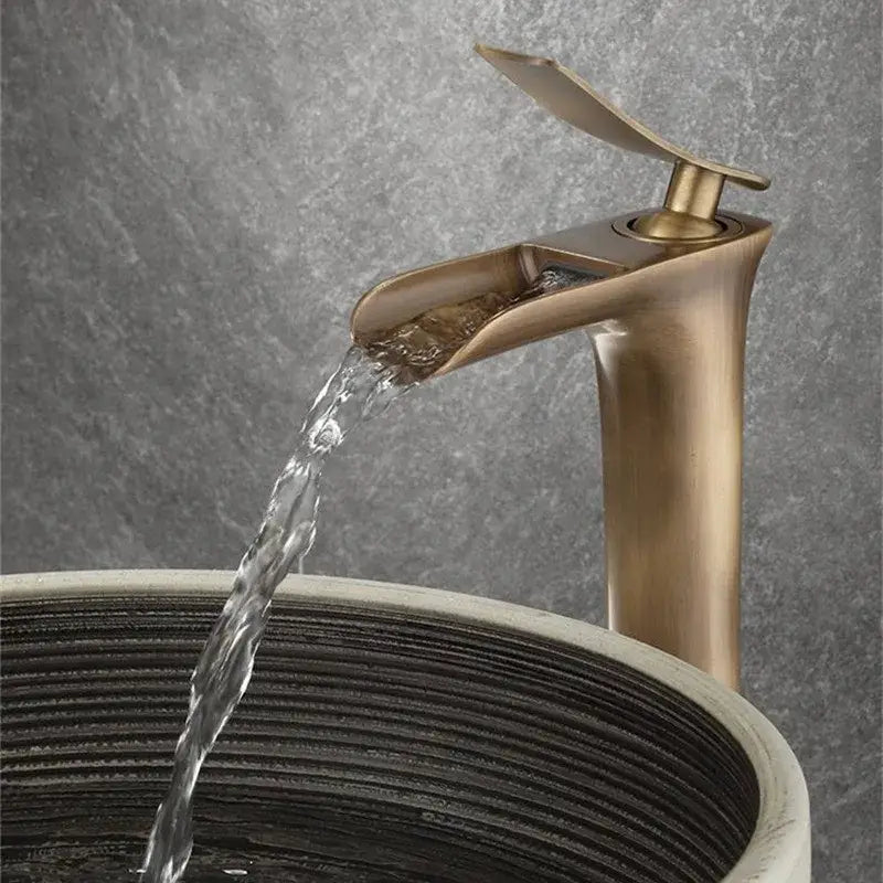 Decorbites antique bronze waterfall bathroom faucet with brass finish sleek modern design hot cold mixer tap