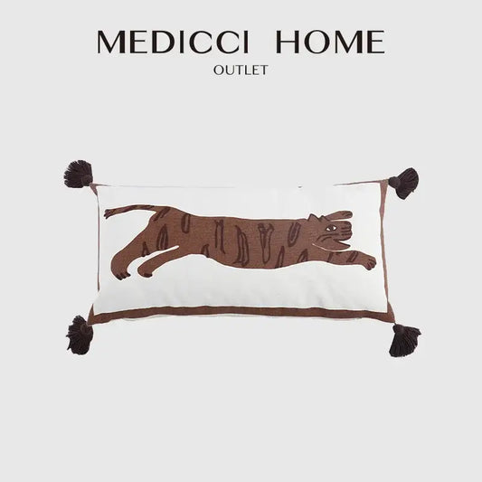 White rectangular pillow cover with antique brown tiger print embroidery and dark brown tassels by medicci home outlet