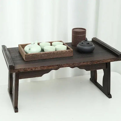 Dark wood decorbites antique chinese style solid wood tea table with carved legs and scalloped edge for hanfu shoots and tea time