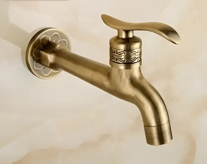 Decorbites antique garden bibcocks tap in antique brass finish with ornate floral detailing for outdoor and bathroom use