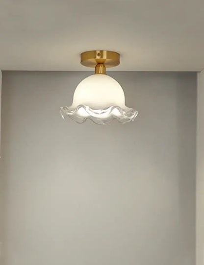 DecorBites antique glass ceiling light with white glass pendant, gold-toned brass base, and scalloped edge design