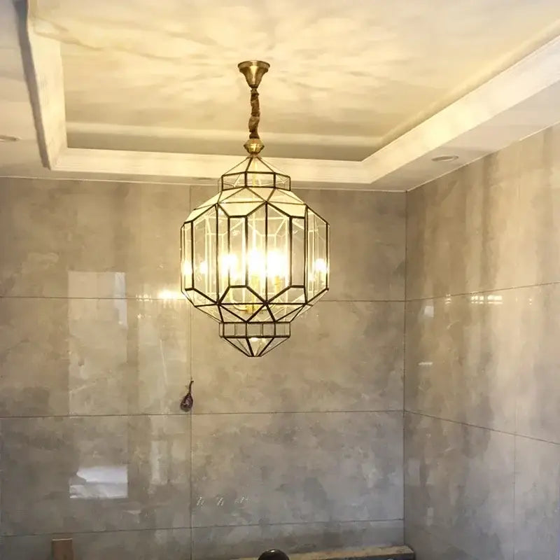 Decorbites antique glass pendant light featuring a geometric brass and copper vintage glass pendant design