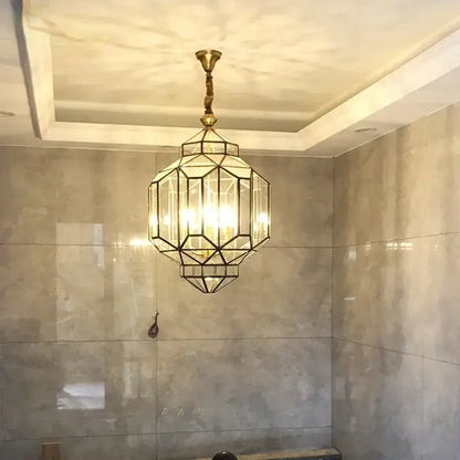 Decorbites antique glass pendant light featuring a geometric brass and copper vintage glass pendant design