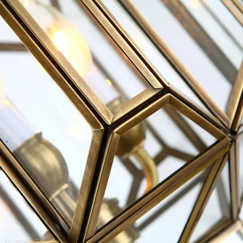 DecorBites™ antique glass pendant light with brass geometric frame clear panels and visible filament bulbs
