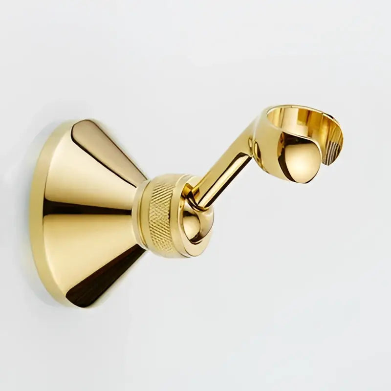 Gold-colored brass towel rack with a sleek polished finish paired with decorbites antique shower head holder stand