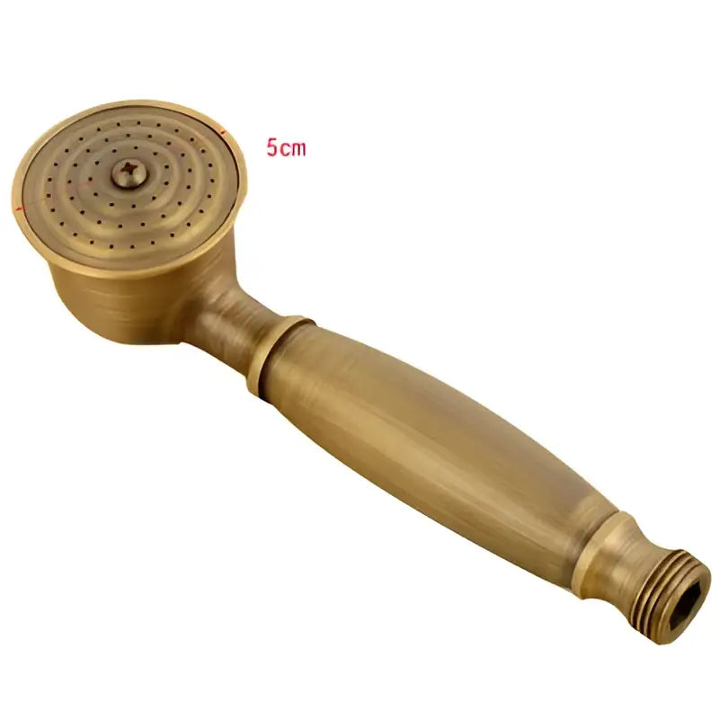 Brass-colored decorbites antique handheld shower head with circular spray face and textured handle for bathroom use