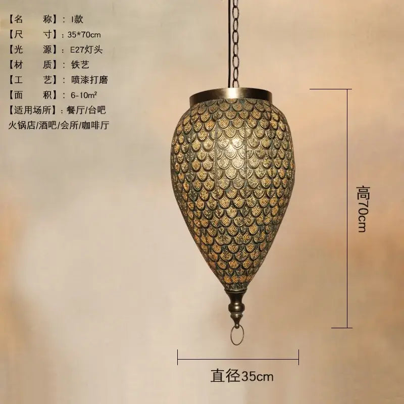 Ornate teardrop pendant light with antique hollow carving and metallic gold bronze finish by decorbites for vintage decor