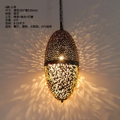 Ornate dark iron decorbites antique hollow carving pendant light casting warm glow for home and hotel decor