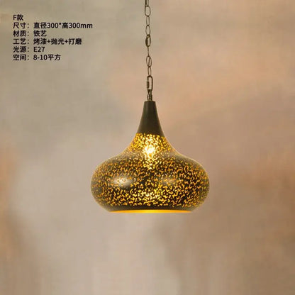 Golden speckled iron pendant light with teardrop shape and intricate antique hollow carving by DecorBites antique hollow