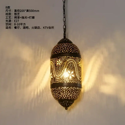 Decorbites antique hollow brass pendant light with intricate floral carving and warm glow for vintage home decor