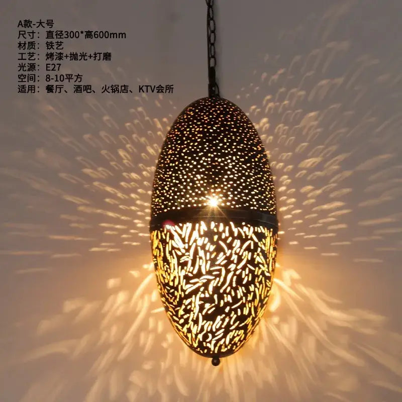Elegant black iron pendant light with intricate antique hollow carving patterns by DecorBites for vintage home decor
