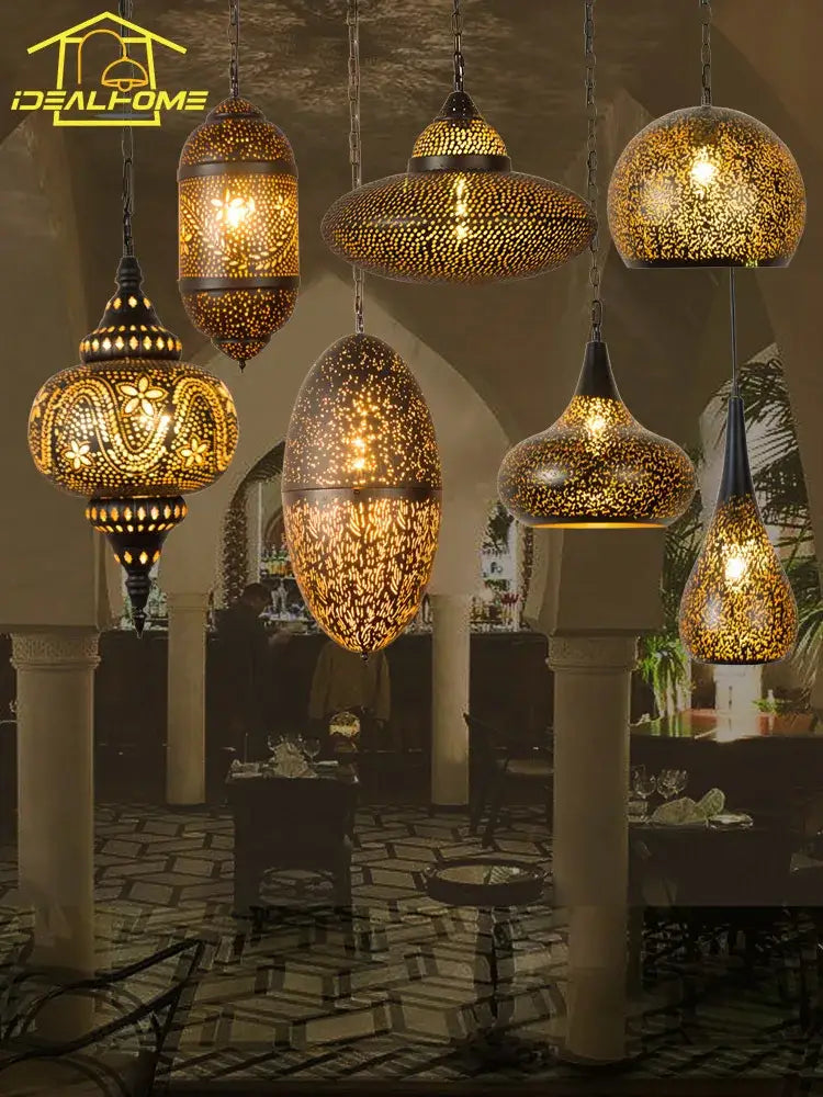 Golden moroccan-style decorbites antique hollow carving pendant light with intricate metalwork and warm glowing interior