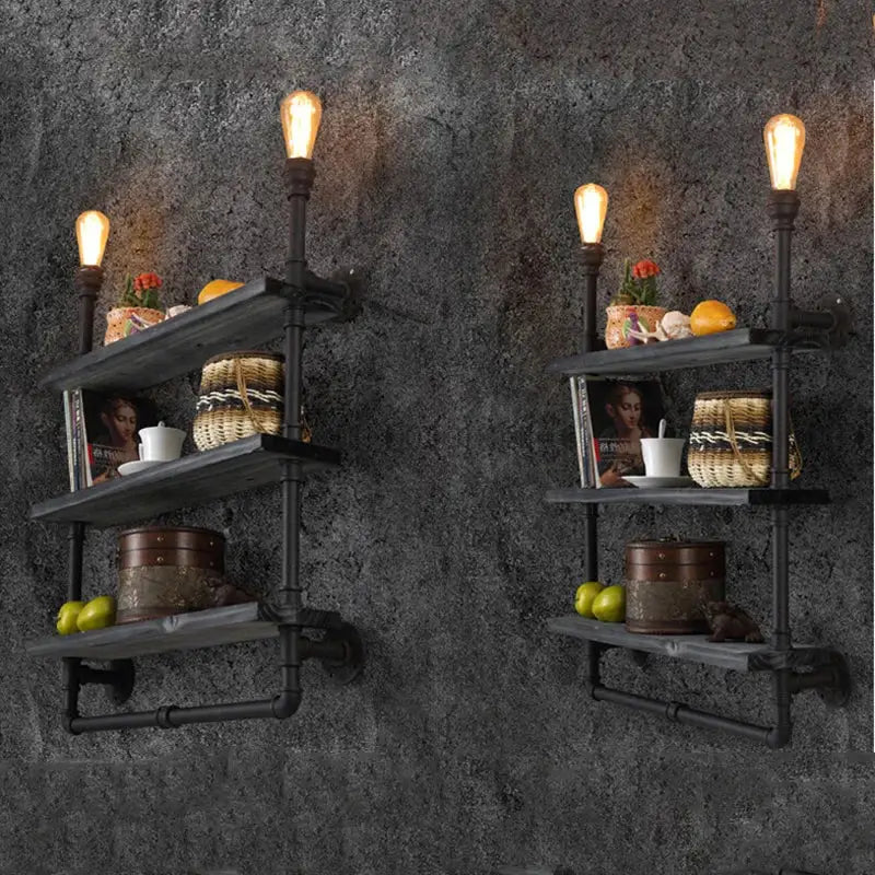 DecorBites antique industrial wall lamp with dark gray wood shelves and black metal frame topped by glowing Edison bulbs