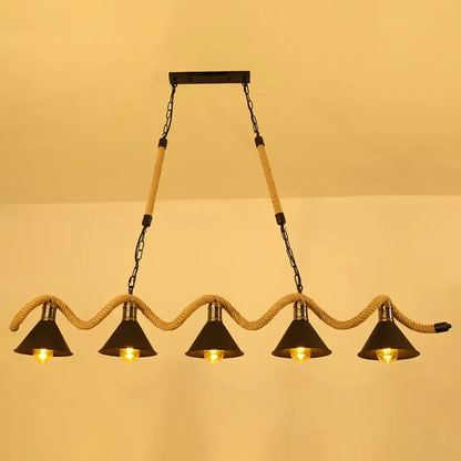 DecorBites antique iron hanging island light in black with four conical shades suspended by hemp rope and chain