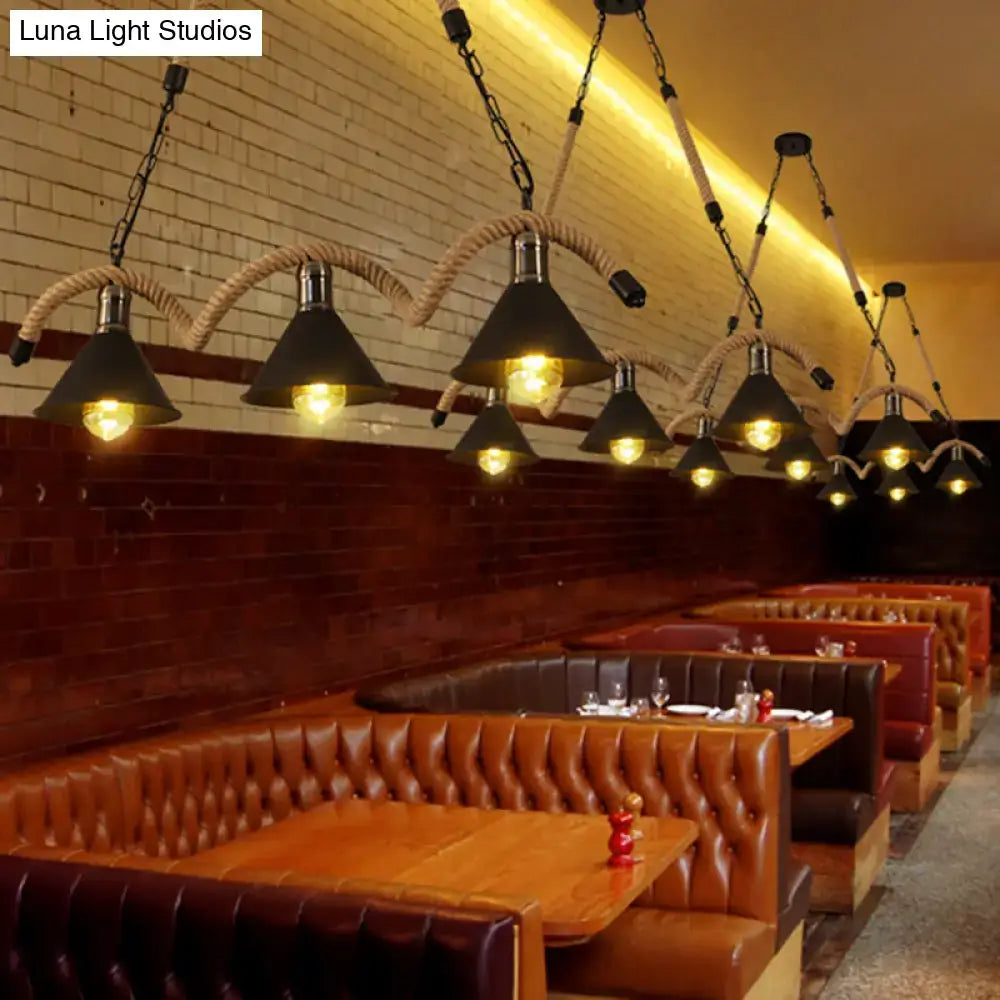 Decorbites™ antique iron hanging island light in black with hemp rope suspension and exposed filament bulbs