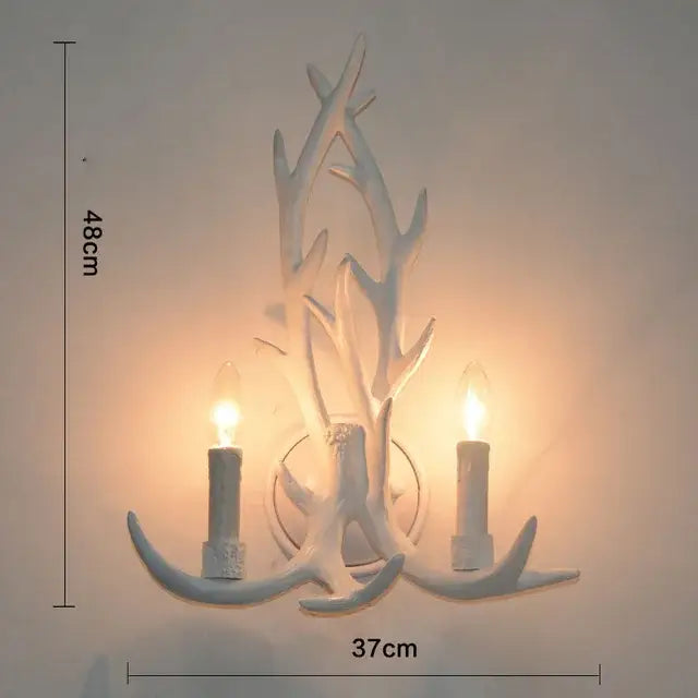 Decorbites antique resin white antler-themed wall sconce with two candle-style lights resin antler chandelier