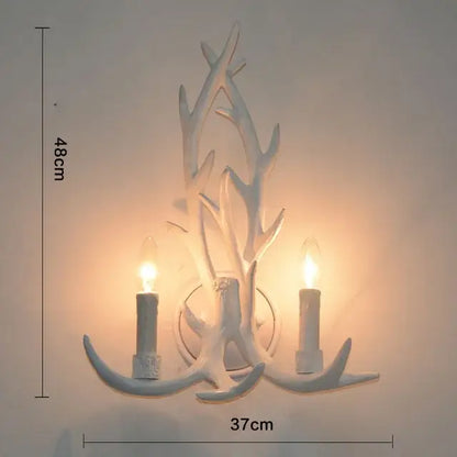 Decorbites antique resin white antler-themed wall sconce with two candle-style lights resin antler chandelier