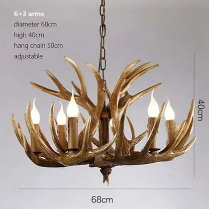 DecorBites antique resin antler chandelier with six arms and three decorative branches in golden-brown finish