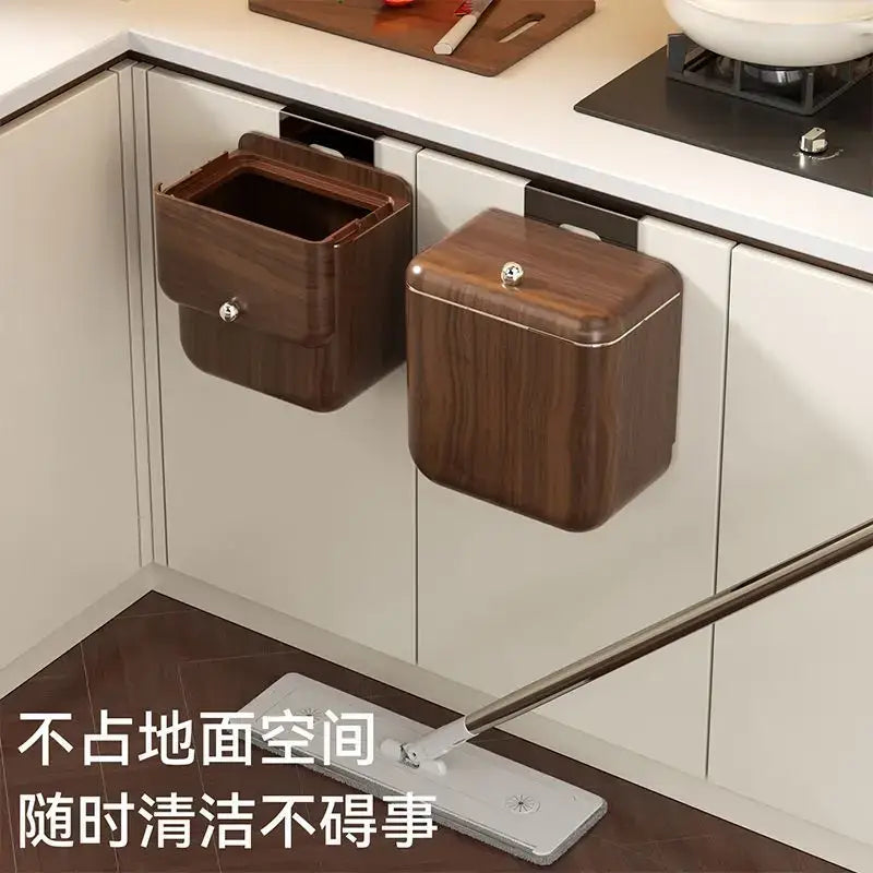 Two sleek dark wood-finish wall-mounted kitchen trash cans with metallic latches in decorbites antique style wood grain