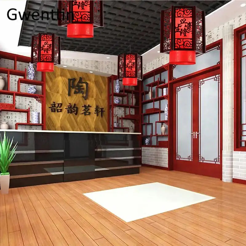 Red lantern pendant lights with intricate black cut-out patterns from decorbites antique wood pendant collection for dining room