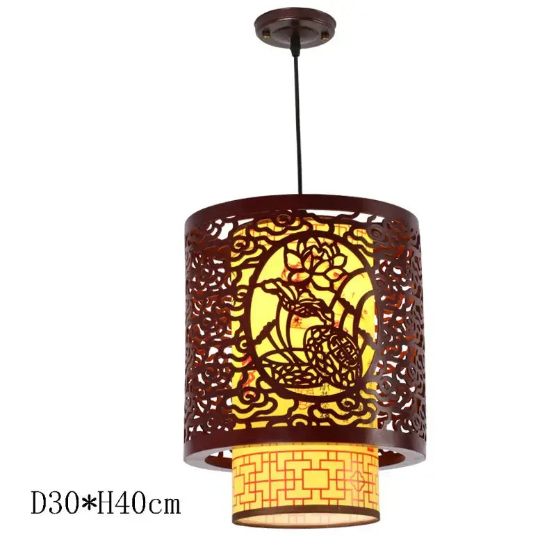 This decorbites antique wood pendant light features a dark brown carved cylindrical design with lotus illumination