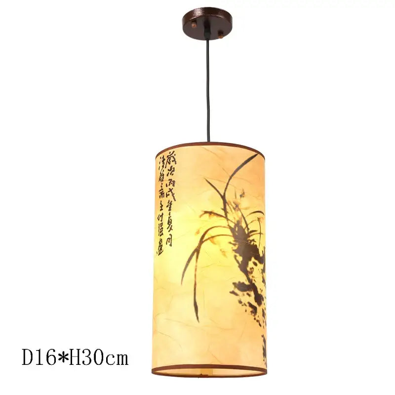 Cylindrical decorbites antique wood pendant light with warm yellow paper shade and black orchid brushstroke decor