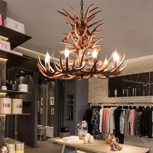 Decorbites antler branch ceiling chandelier with rustic bronze finish and multiple lit bulbs for indoor lighting