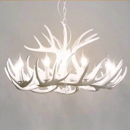 White decorbites antler chandelier with multiple illuminated resin horn bulbs for rustic indoor decor